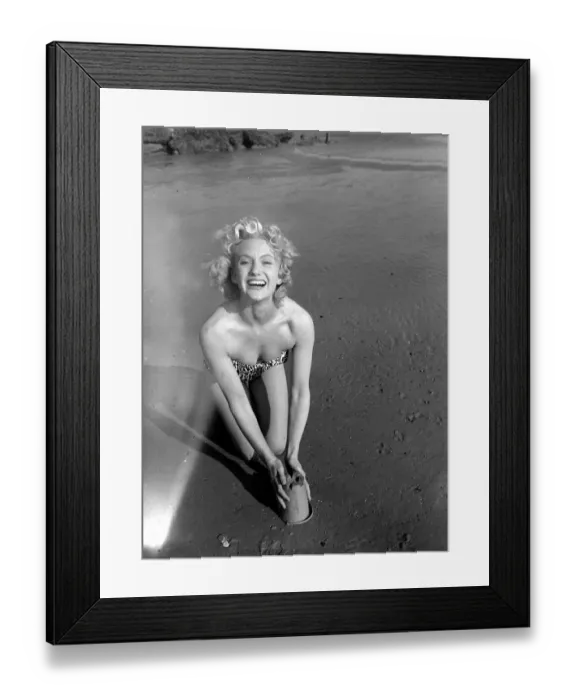 Framed Print : A model wearing a bikini as she enjoys the sun on the beach at Hove March 1959 Framed Print : A model wearing a bikini as she enjoys the sun on the beach at Hove March 1959