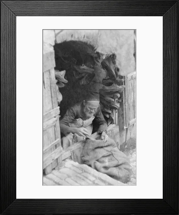 Framed Print : A cobbler at work in Jerusalam Circa 1935 Framed Print : A cobbler at work in Jerusalam Circa 1935