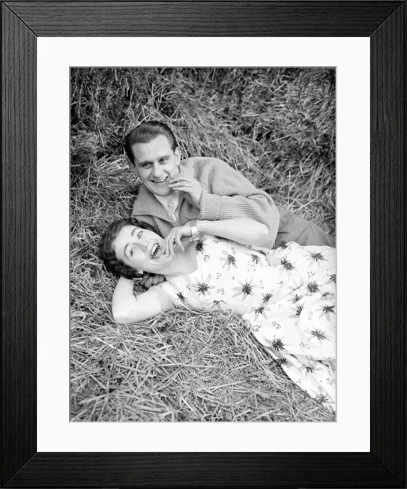 Framed Print : Couple Catherine Egan and Francis Byrne enjoy a relaxing break in a haystack March Framed Print : Couple Catherine Egan and Francis Byrne enjoy a relaxing break in a haystack March