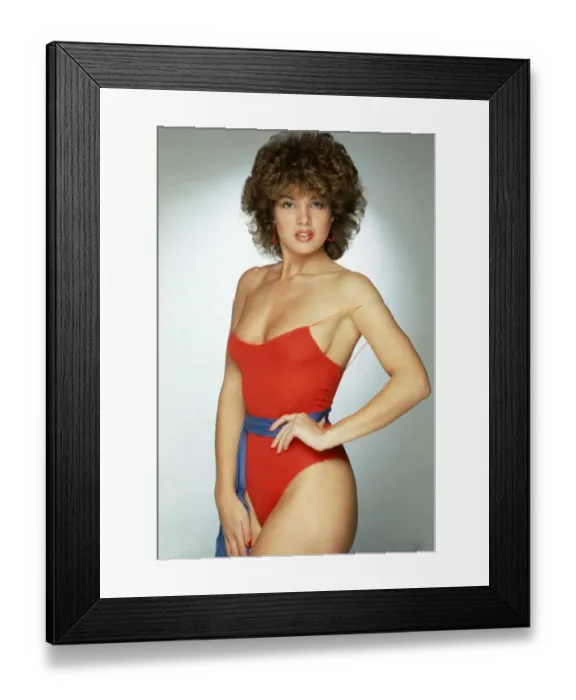 Framed Print : Claudia Glamour Model wearing red swimming costume February 1984