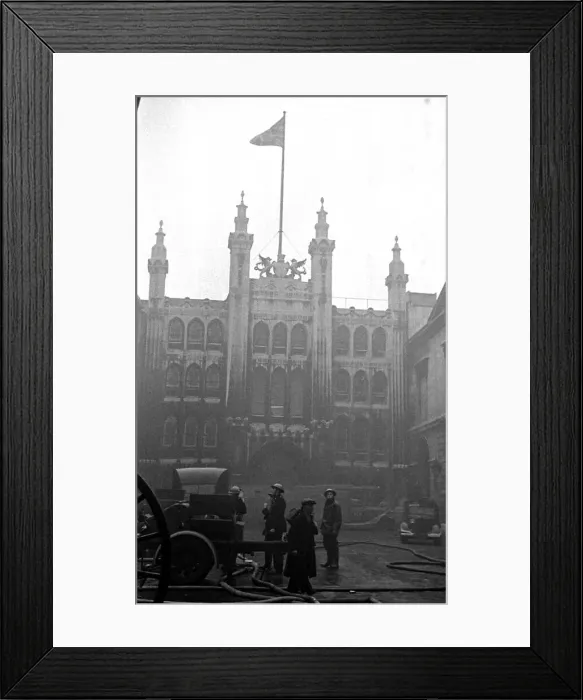 Framed Print : L. F.s Firemen attend a fire in the city of London on Sunday night near the Guildhall Framed Print : L. F.s Firemen attend a fire in the city of London on Sunday night near the Guildhall