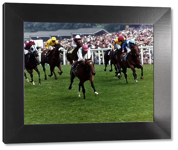 Danehill wins with jockey Willie Carson from Nabeel Dancer (right