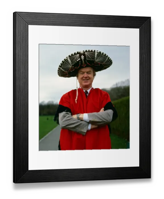 Framed Print : Archie McPherson Sports Commentator pictured wearing red cape and sombrero hat April 1987 Framed Print : Archie McPherson Sports Commentator pictured wearing red cape and sombrero hat April 1987