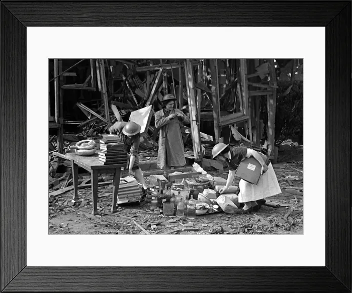 Framed Print : Nurses take a record of the remains in the midst of the bomb damage at London Hospital Framed Print : Nurses take a record of the remains in the midst of the bomb damage at London Hospital