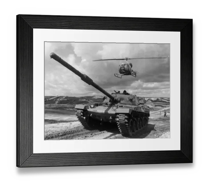 Framed Print : A Chieftan tank of the Royal Amoured Corp seen here on exercise with a army helicopter Framed Print : A Chieftan tank of the Royal Amoured Corp seen here on exercise with a army helicopter