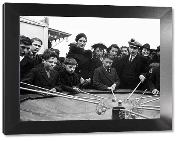 Children and adults playing a game at Blackheath Fair April 1938
