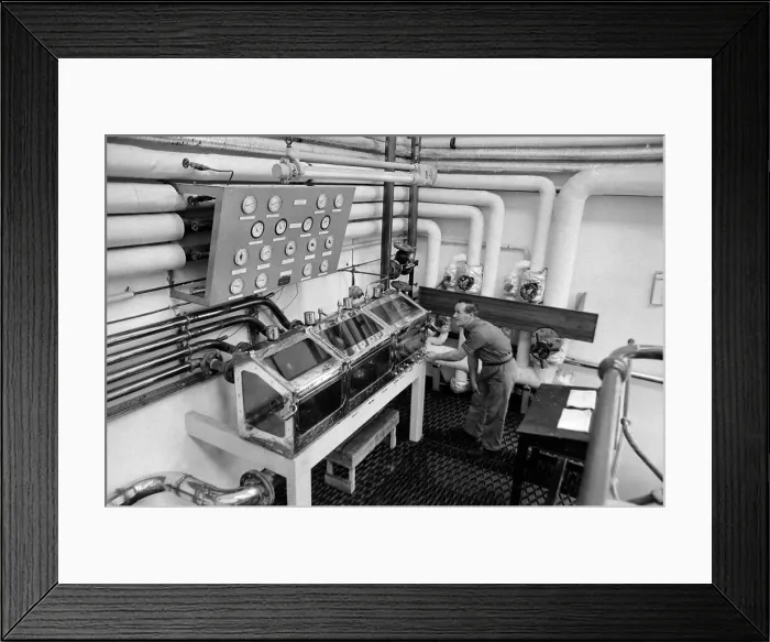 Framed Print : A worker inspects the Spirit safe at the Knockando Whisky Distillery January 1 972 Framed Print : A worker inspects the Spirit safe at the Knockando Whisky Distillery January 1 972