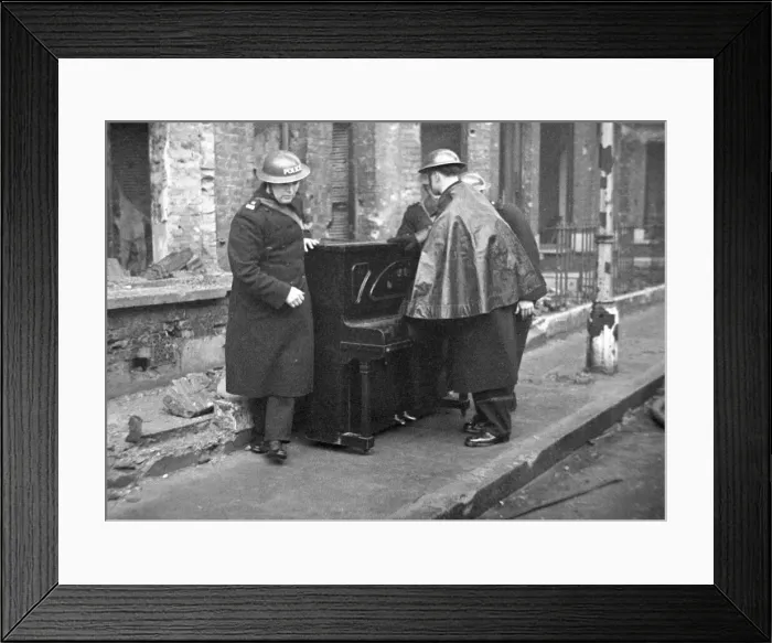 Framed Print : Policemen with a piano help salvage furniture following a V2 attack on Woodbine Framed Print : Policemen with a piano help salvage furniture following a V2 attack on Woodbine