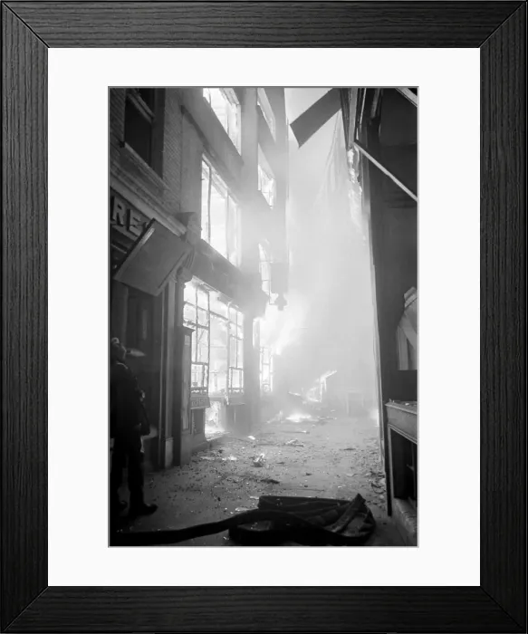 Framed Print : Amen Court Shops Blaze furiously from High Explosive during the 2nd Fire of London Framed Print : Amen Court Shops Blaze furiously from High Explosive during the 2nd Fire of London