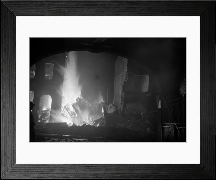 Framed Print : Fireman in the Waterloo area fighting Fires cause by High Explosive bombs during the 2nd