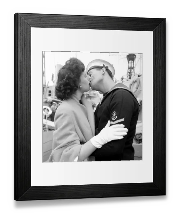 Framed Print : Dorothy Phillips kissing her boyfriend and sailor L. M. E Alex McFarlane when he arrived Framed Print : Dorothy Phillips kissing her boyfriend and sailor L. M. E Alex McFarlane when he arrived