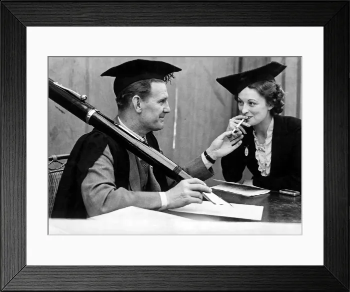Framed Print : Actor Will Hay seen here with an outsize pen, does the vey best to break school rule Framed Print : Actor Will Hay seen here with an outsize pen, does the vey best to break school rule