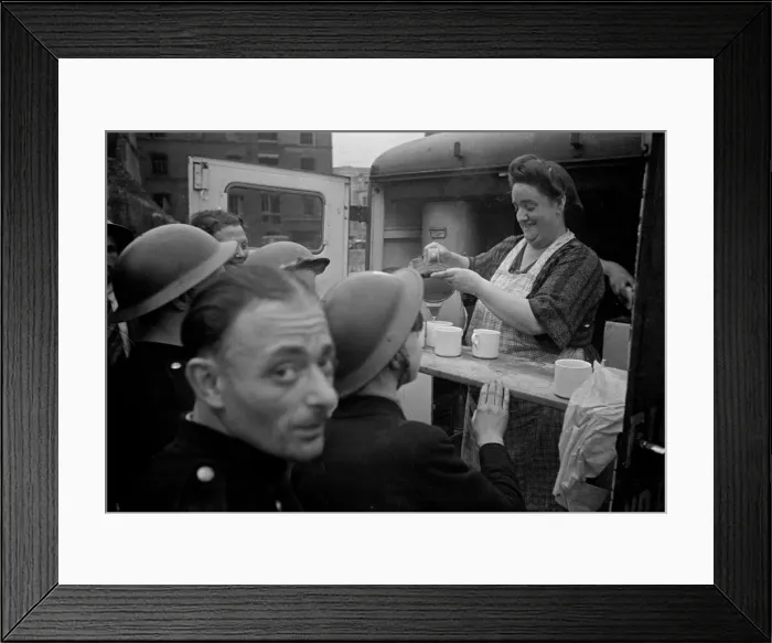 Framed Print : Rescue workers are served tea from a mobile naffi following the V1 bombing of Brown Framed Print : Rescue workers are served tea from a mobile naffi following the V1 bombing of Brown