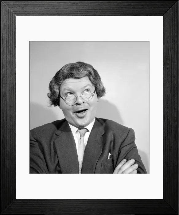 Framed Print : Comedian Benny Hill pictured at home wearing a wig and glasses May 1958 Framed Print : Comedian Benny Hill pictured at home wearing a wig and glasses May 1958
