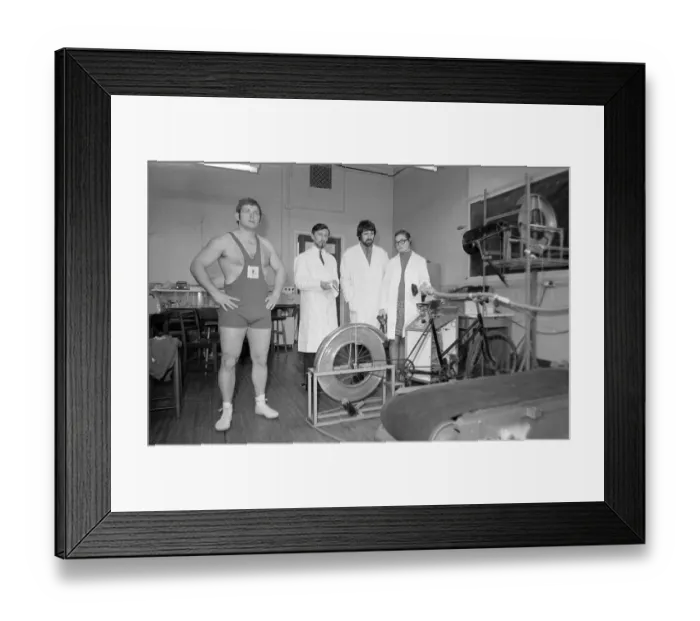 Framed Print : Wrestler Richard Barraclough seen here being put through his paces by Eric Roberts