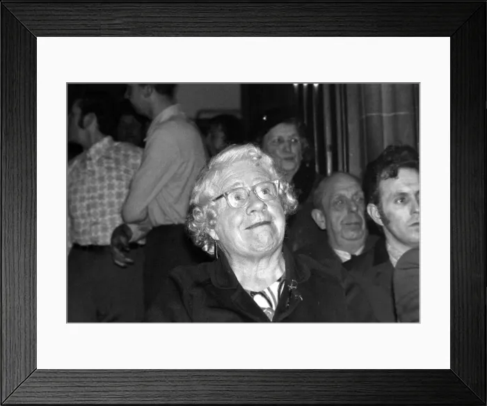 Framed Print : A old lady in the audience cheers on the wrestlers at the Chester Town hall Framed Print : A old lady in the audience cheers on the wrestlers at the Chester Town hall
