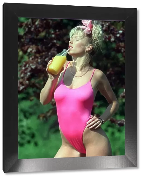 Julie Desmond model in pink swimsuit 1990