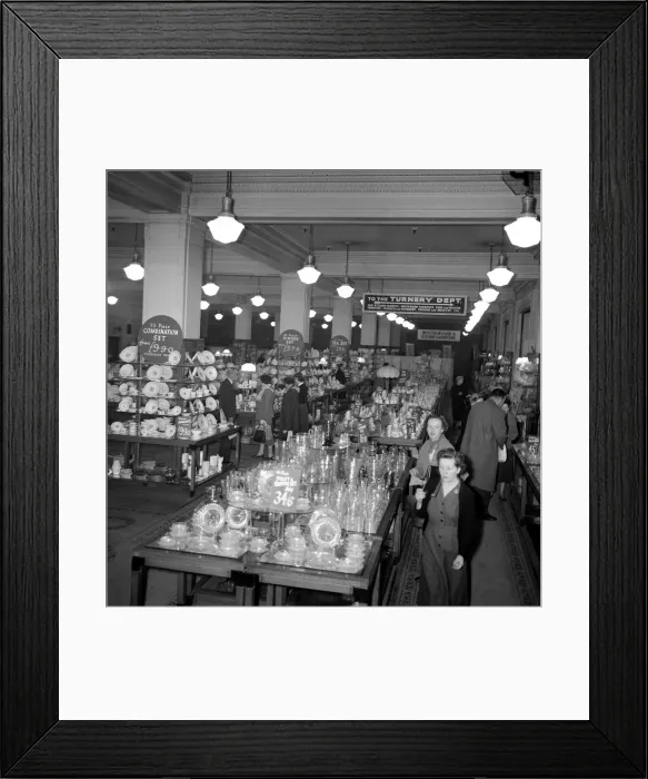 Framed Print : Ladies look at crockery and glasses for sale during the January sales in Kensington High Framed Print : Ladies look at crockery and glasses for sale during the January sales in Kensington High