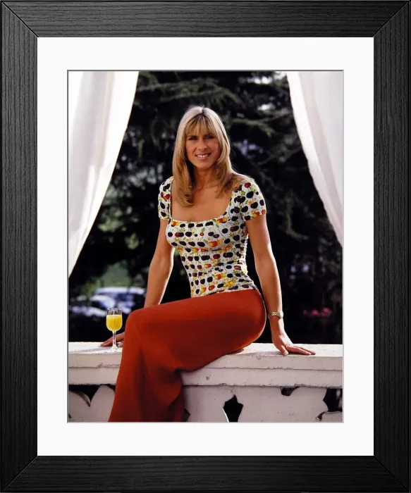 Framed Print : Former British Olympic swimmer Sharron Davies poses wearing floral patterned top