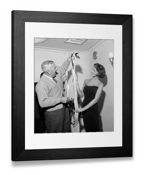 Framed Print : A coat for an eight foot long python to demonstrate a new super-flexible zip fastener