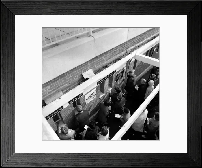 Framed Print : Queues of people waiting to place bets at the tote before a race October 1969 Framed Print : Queues of people waiting to place bets at the tote before a race October 1969