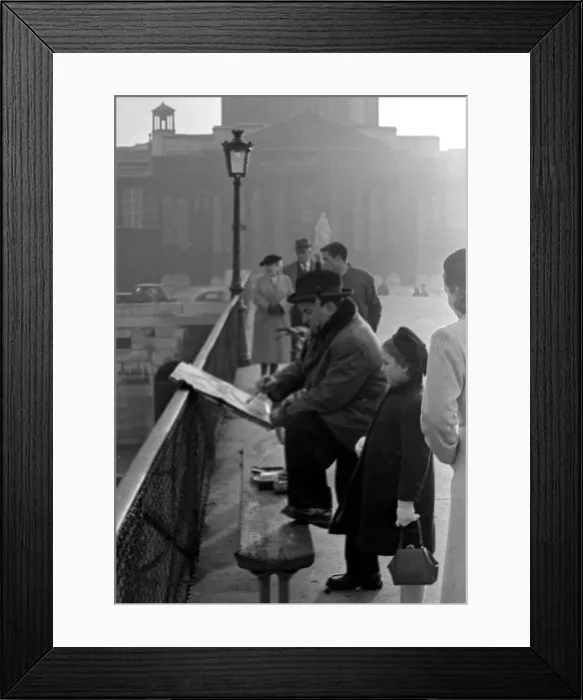 Framed Print : Paris street scenes - child watching an artist paint circa 1951