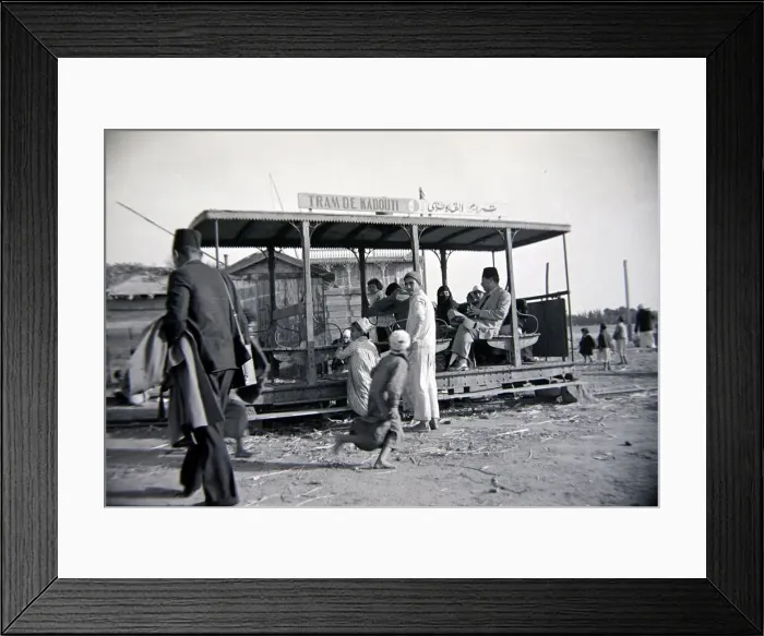 Framed Print : Local people of Kabouti in Egypt using the public trams Circa 1935 People