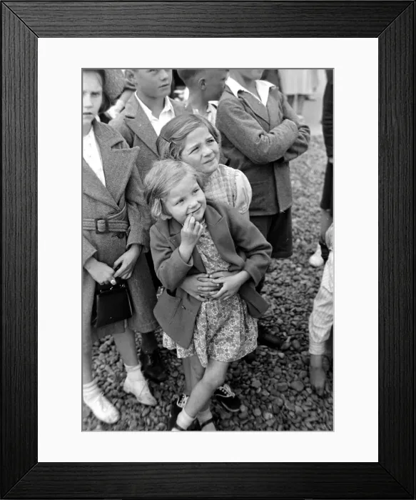 Framed Print : Children watching the Punch and Judy Show on the beach Circa 1935 Children