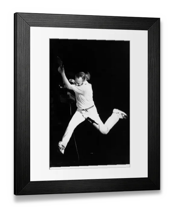Framed Print : The Who pop guitarist Pete Townshend leaping 1989 with guitar at Royal Albert Framed Print : The Who pop guitarist Pete Townshend leaping 1989 with guitar at Royal Albert