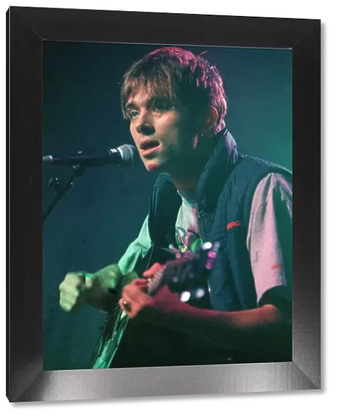 Blur 1997 Damon Albarn singer and playing guitar