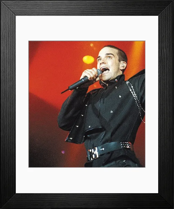 Framed Print : Robbie Williams Take That on stage singing microphone circa 1995 Framed Print : Robbie Williams Take That on stage singing microphone circa 1995