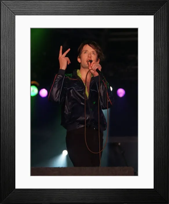 Framed Print : Jarvis Cocker on stage at T In The Park July 1996 Swearing at the audience Framed Print : Jarvis Cocker on stage at T In The Park July 1996 Swearing at the audience