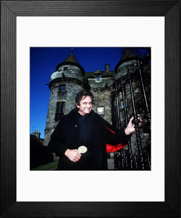 Framed Print : Johnny Cash at Falkland Palace, 1992 holding gate Framed Print : Johnny Cash at Falkland Palace, 1992 holding gate