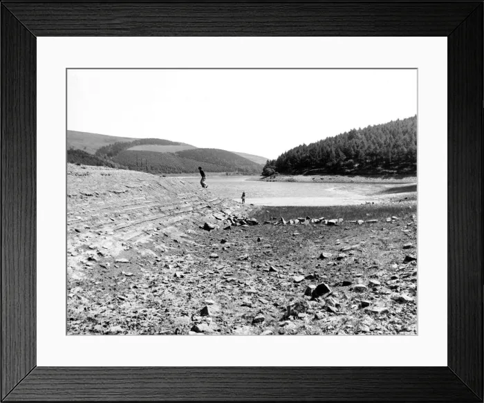 Framed Print : Derwent reservoir near Sheffield, showing the low water due to the continuing drought in Framed Print : Derwent reservoir near Sheffield, showing the low water due to the continuing drought in