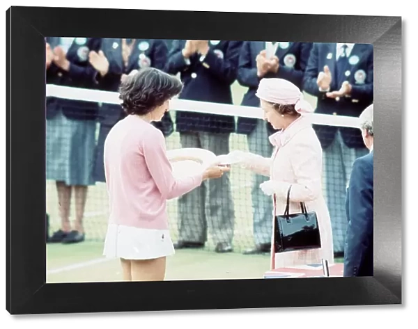 Virginia Wade receives the Wimbledon womens trophy 1977 from the Queen