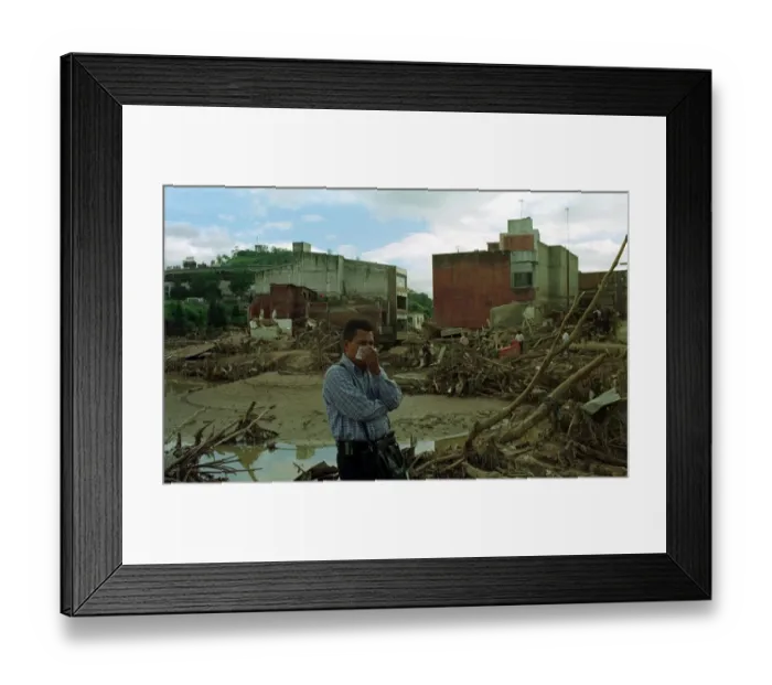 Framed Print : Honduras Weather Hurricane Mitch Nov 1998 Debris mounted up behind him Framed Print : Honduras Weather Hurricane Mitch Nov 1998 Debris mounted up behind him