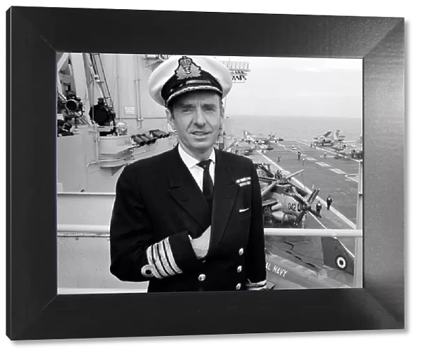 Captain of HMS Ark Royal Captain Lygo on top of the bridge of the aircraft carrier after
