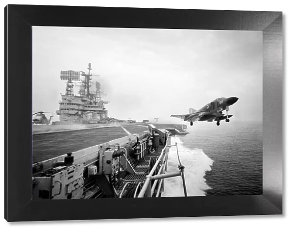 A Phantom aircraft takes off from the new angled flight deck of HMS Ark Royal in