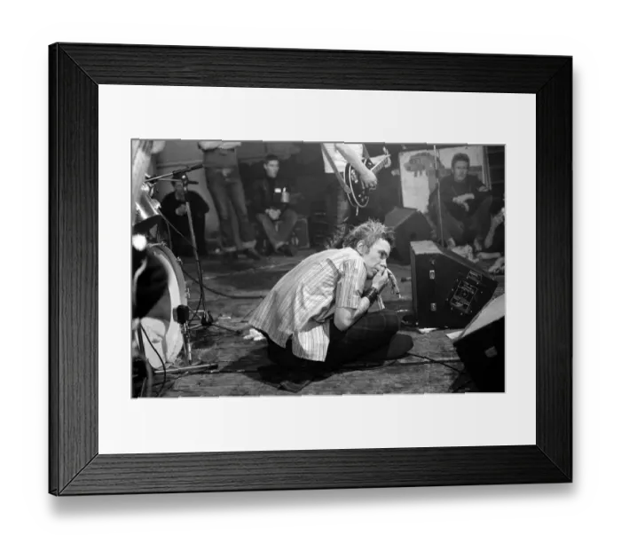 Framed Print : Johnny Rotten- lead singer with the Sex Pistols performing in Holland, 11 / 12 / 1977 Framed Print : Johnny Rotten- lead singer with the Sex Pistols performing in Holland, 11 / 12 / 1977