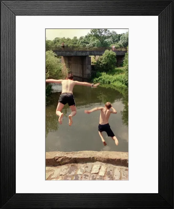 Framed Print : Boys jumping from bridge into water July 1997 Framed Print : Boys jumping from bridge into water July 1997