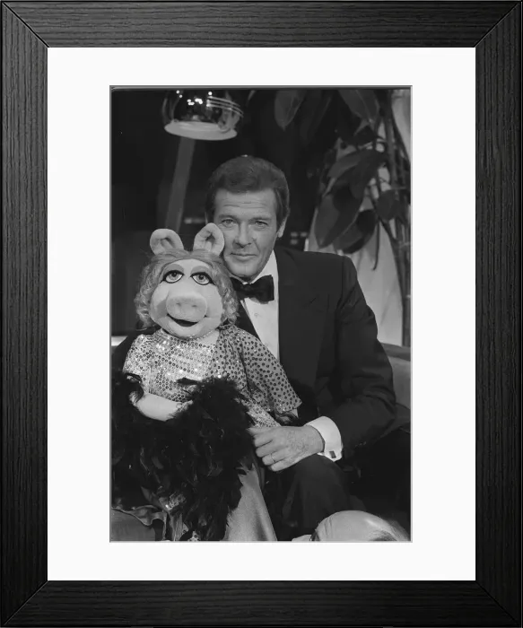 Framed Print : Roger Moore meets Miss Piggy from the Muppets 80-2307 Box 29 Date 1 Framed Print : Roger Moore meets Miss Piggy from the Muppets 80-2307 Box 29 Date 1