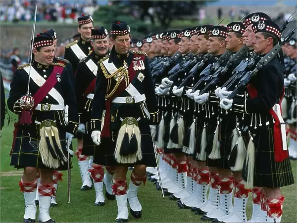 Prince Charles Prince of Wales inspecting troops with highland uniform  /  kilt at Fort