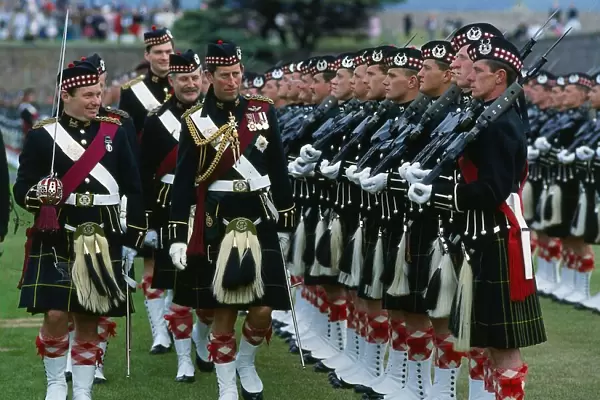 Prince Charles Prince of Wales inspecting troops with highland uniform  /  kilt at Fort