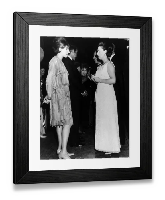 Framed Print : HRH Princess Margaret chatting with American singer and actress Barbra Streisand after
