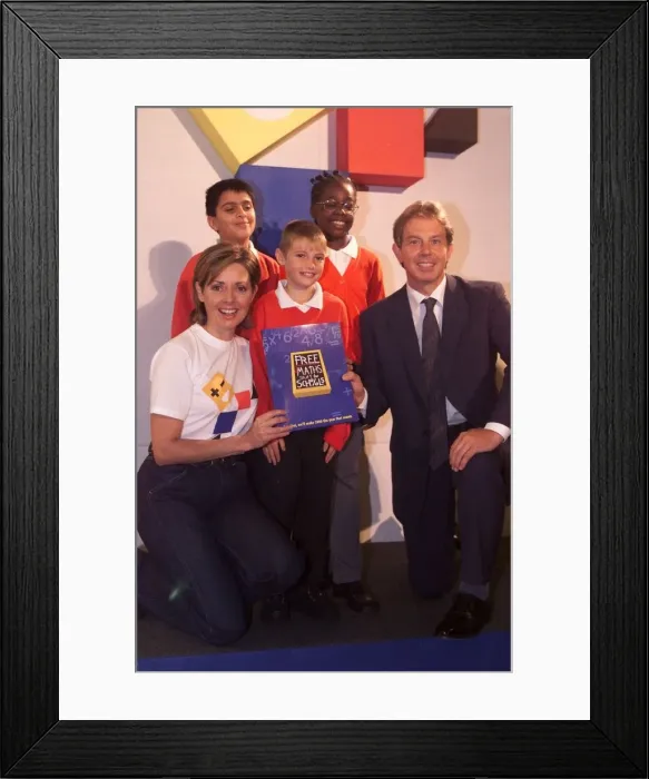 Framed Print : Tony Blair MP and Carol Vorderman September 1999 with school children Framed Print : Tony Blair MP and Carol Vorderman September 1999 with school children