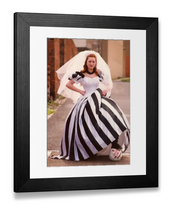 Framed Print : Sarah Robey models the black and white wedding dress which will be on show at an Framed Print : Sarah Robey models the black and white wedding dress which will be on show at an