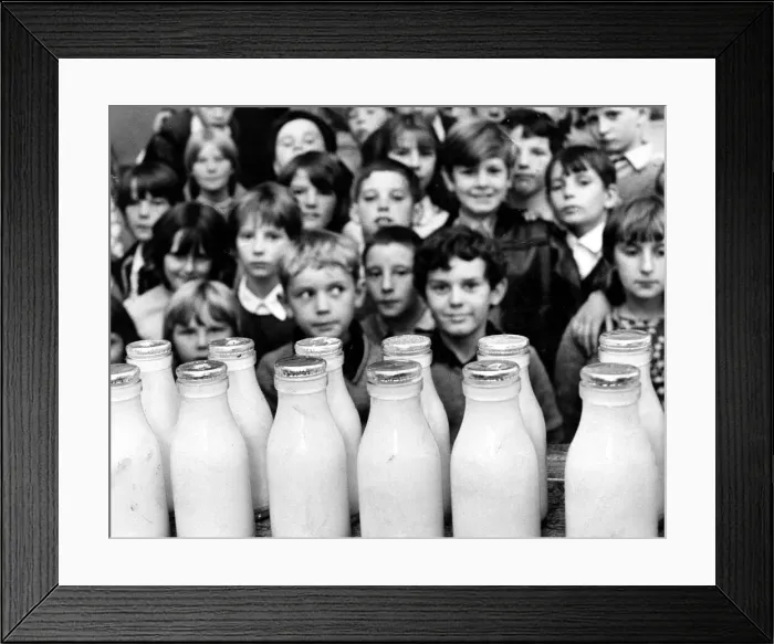 Framed Print : Children waiting for their daily bottle of milk. Circa 1970 Framed Print : Children waiting for their daily bottle of milk. Circa 1970