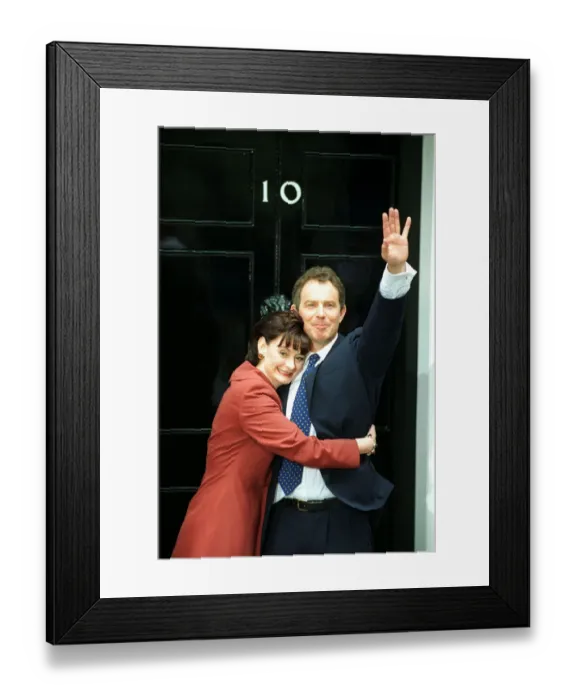 Framed Print : PRIME MINISTER TONY BLAIR AND CHERIE BLAIR WAVE TO THE CROWDS AS THEY PREPARE TO ENTER Framed Print : PRIME MINISTER TONY BLAIR AND CHERIE BLAIR WAVE TO THE CROWDS AS THEY PREPARE TO ENTER