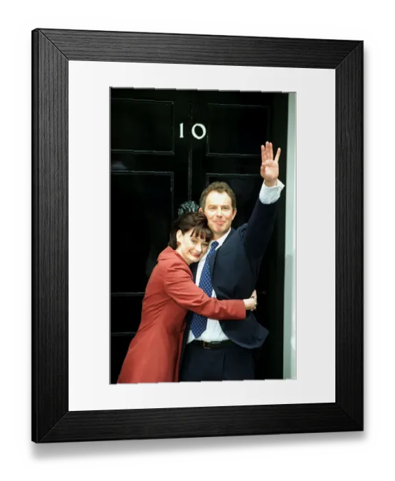Framed Print : Tony Blair and wife Cherie stand at the door of 10 Downing Street waving to the crowd