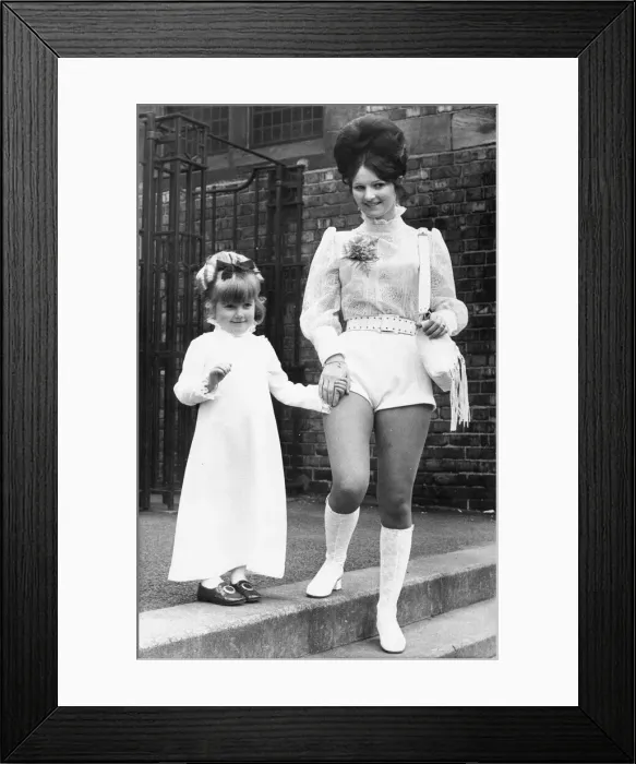 Framed Print : Bride standing with one of her bridesmaids Framed Print : Bride standing with one of her bridesmaids